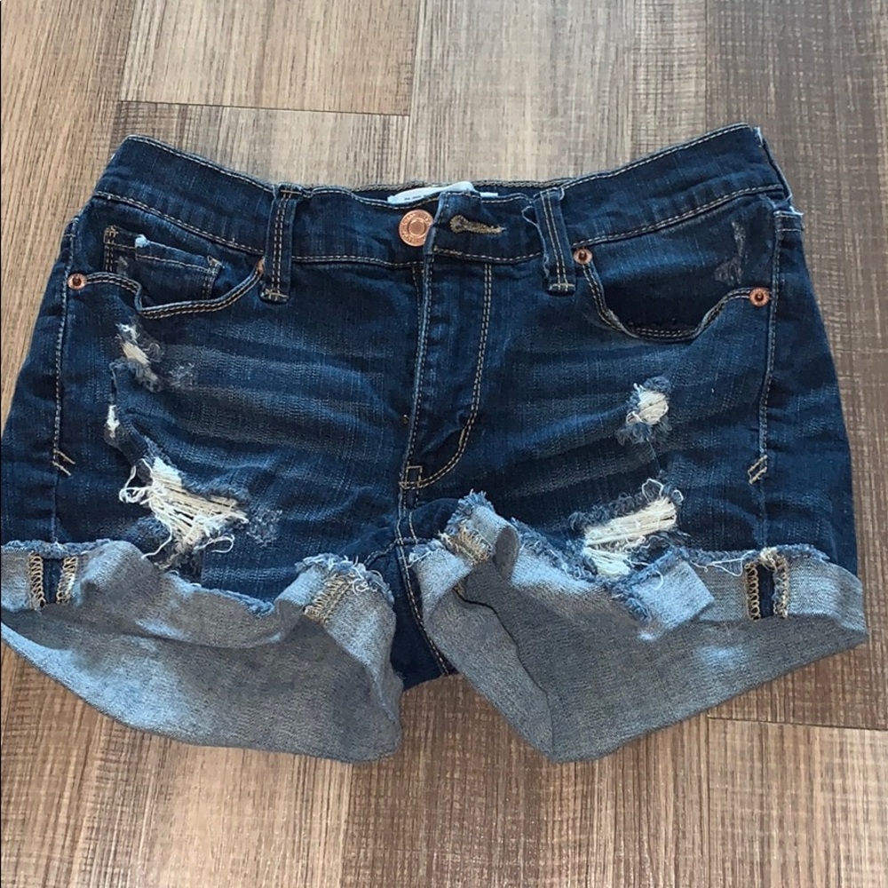 Distressed denim shorts
